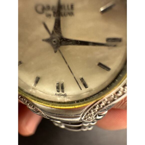 Vtg Caravelle by Bulova Silver Tone White Dial Diamond Accent Women’s Watch 24mm